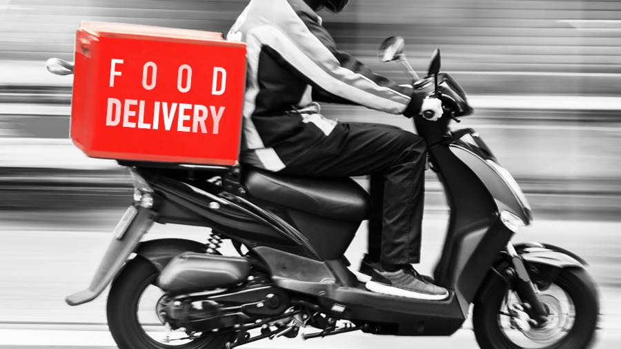 scooter delivery service in motion blur